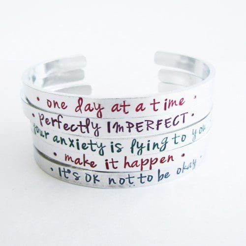 6mm aluminium cuff hand-stamped with a motivational quote in a choice of colours