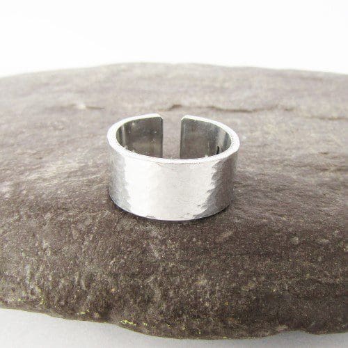 9mm wide hammered texture aluminium cuff ring with a hand-stamped hidden message inside