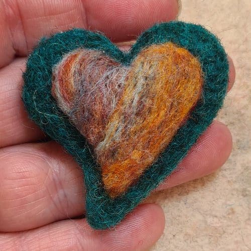 Teal and orange needle felted heart brooch