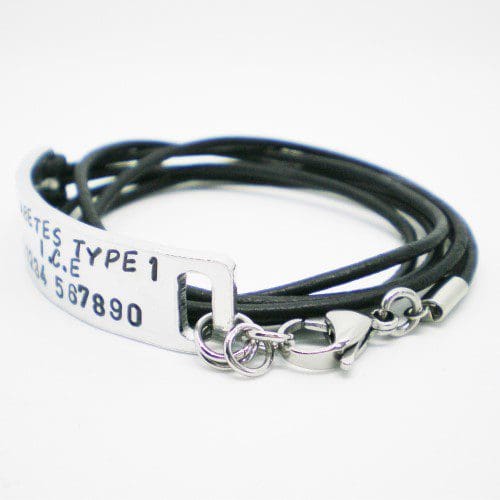 personalised hand stamped medical ID aluminium bar with a leather cord wrap-style bracelet