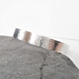 9mm hammered texture aluminium cuff bracelet with a hand-stamped hidden message inside