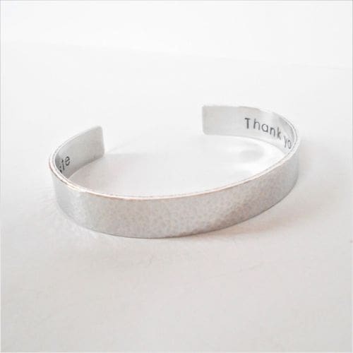 9mm hammered texture aluminium cuff bracelet with a hand-stamped hidden message inside
