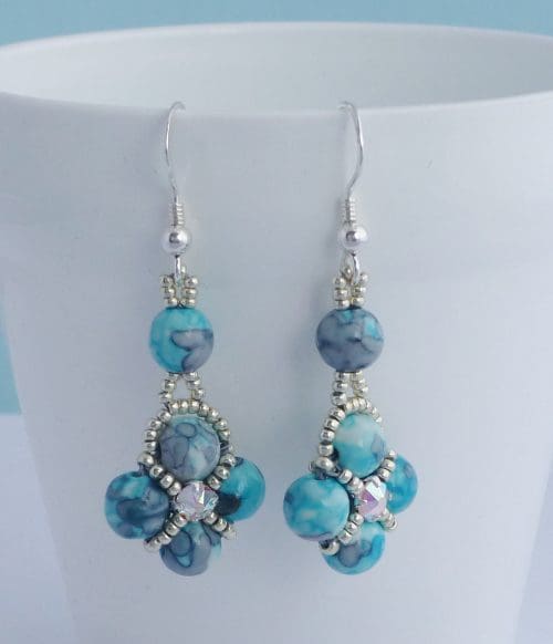 Turquoise and Grey Beaded Quatrefoil Dangle Earrings | The British ...