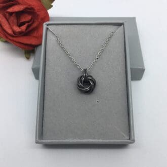 Iron Infinity Knot Pendant Necklace
