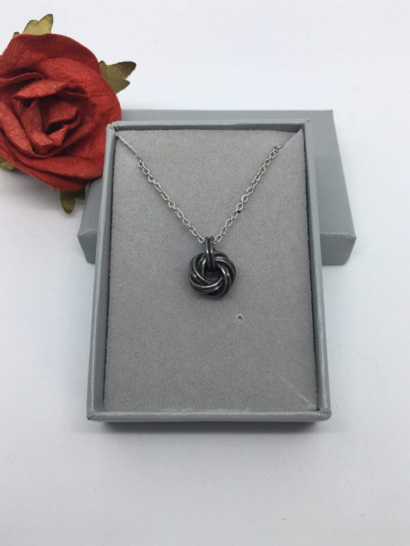 Iron Infinity Knot Pendant Necklace