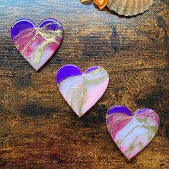set of three pink hanging hearts