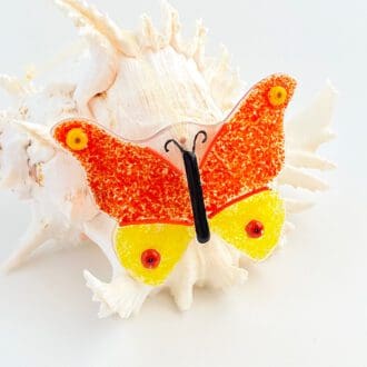 Orange and red fused glass butterfly