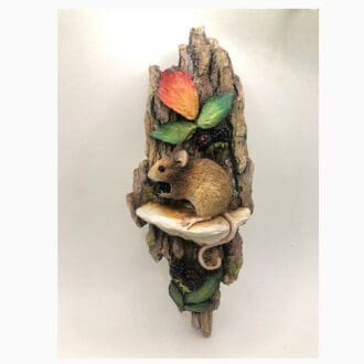 Mouse sculpture wall art showing a woodmouse sitting on bracket fungus with Bramble leafs