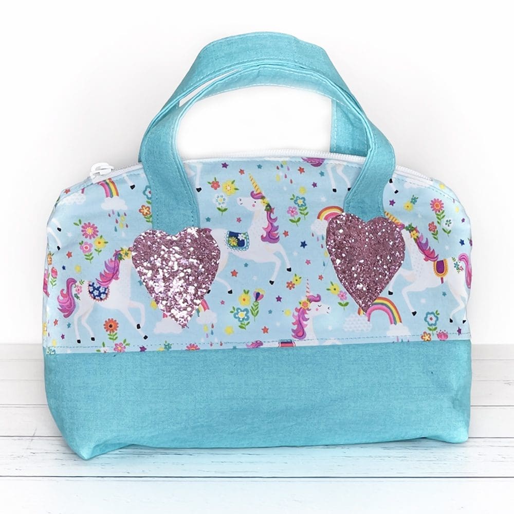 Toy handbag in aqua with unicorn design
