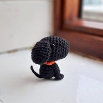 Black puppy soft sculpture
