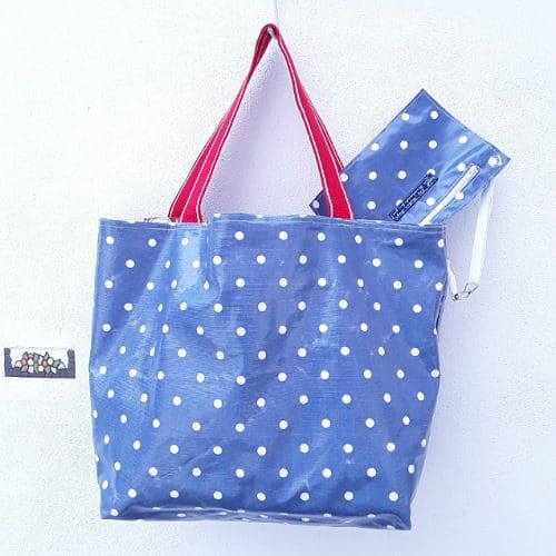 Beach bag, reversed to show white spot on blue vinyl