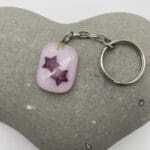 Pink keyring with copper stars (version 2)