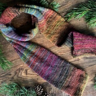 Long light weight scarf in rich subtle jewel tones