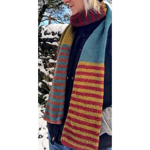 Long knitted scarf with blocks of plain autumn colours and thin stripes