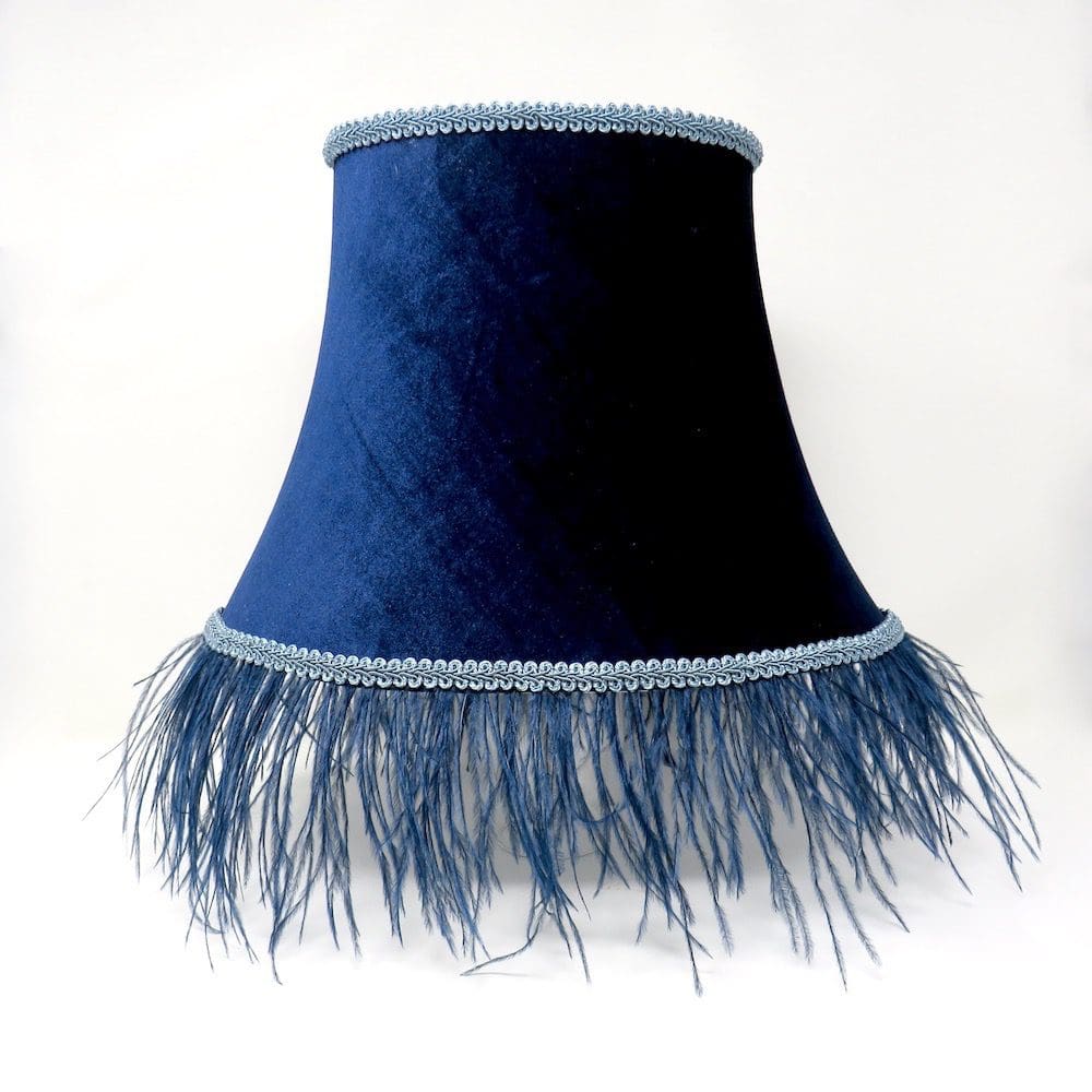 A stunning navy velvet lampshade with an Ostrich feather trim.