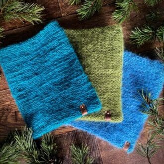 Knitted fluffy neck warmers in olive, teal and blue