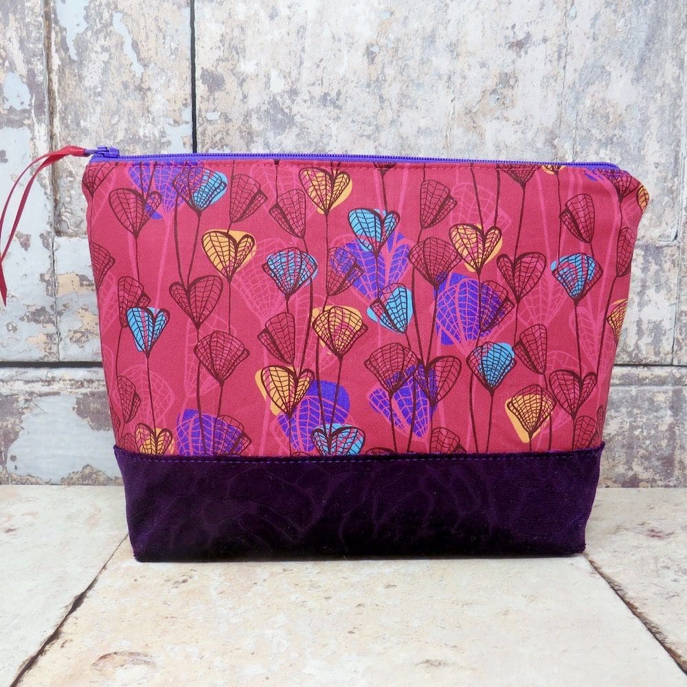 Handmade pink and purple zipped makeup bag