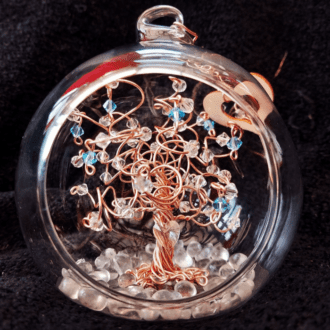 Rose Gold wire tree decorated with clear crystals and birthstones and a clear crystal heart wired near the roots set into an 8cm open fronted glass bauble.