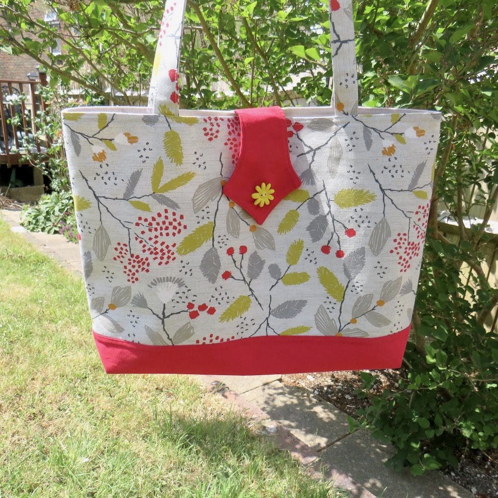 Scandi print shopping tote with button detail