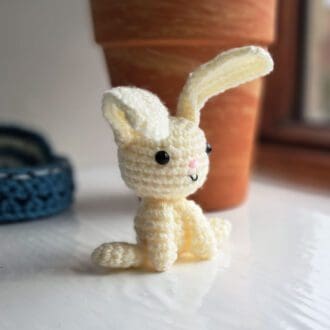 Cream bunny crocheted soft sculpture figure