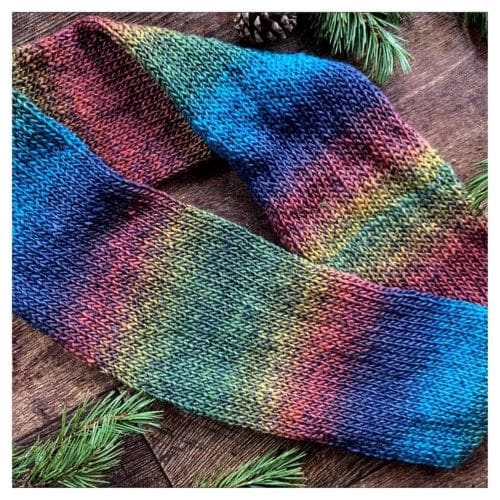 Knitted infinity scarf in shades of a tweed rustic rainbow
