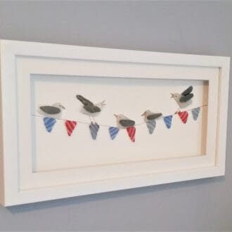framed picture of sea gulls on bunting made with Cornish sea glass
