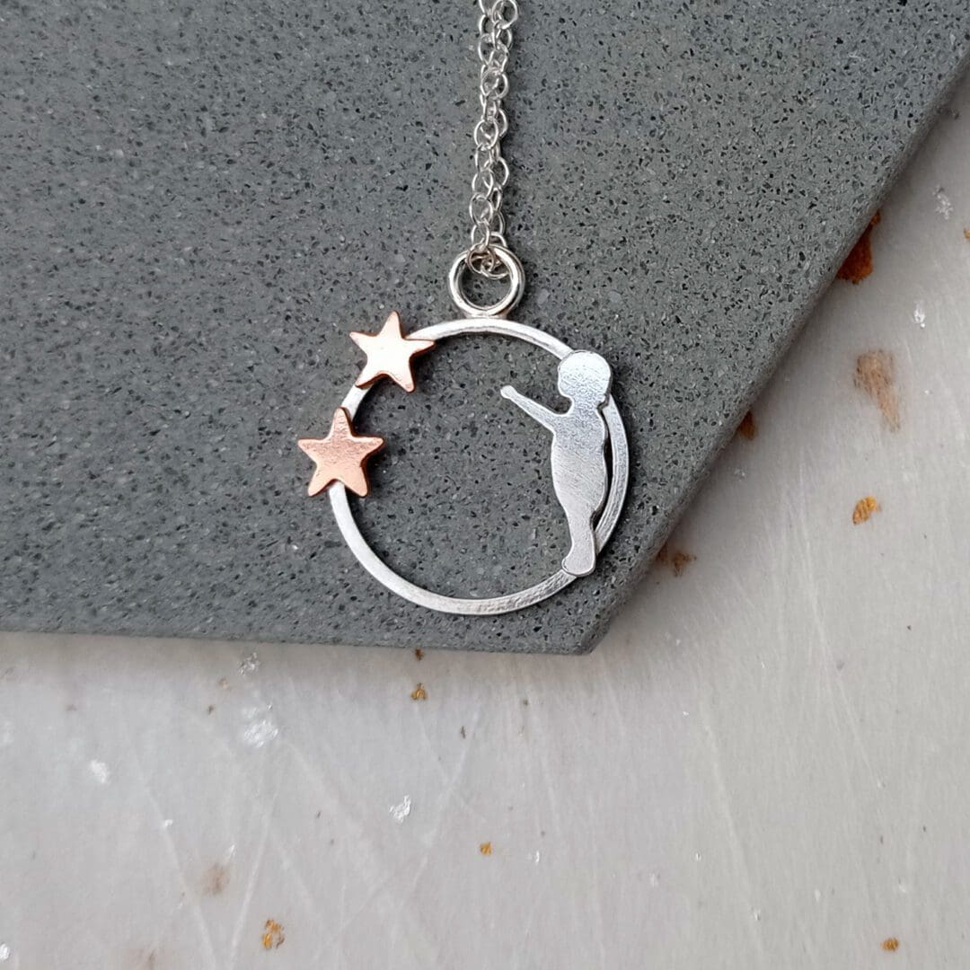 sterling silver figure and copper stars necklace