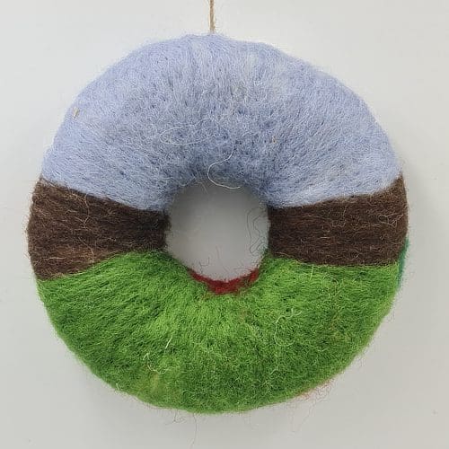 Back view of needle felted poppy wreath