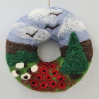 Needle felted poppy wreath with sheep