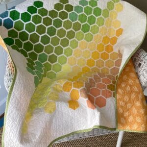 Modern baby hexagon quilt in autumn colours