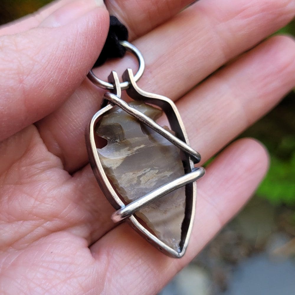 Flint arrow head encased in Sterling Silver