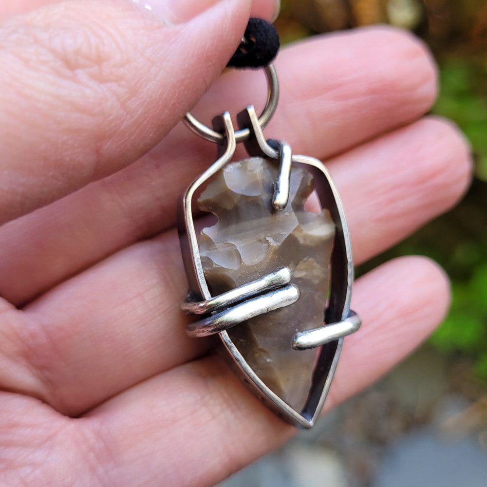 Flint arrow head encased in Sterling Silver