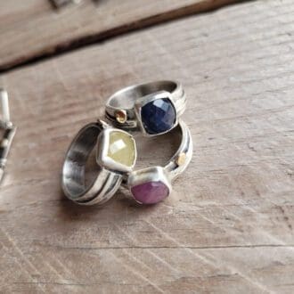 silver, gold and sapphire ring