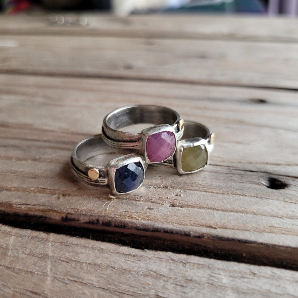 silver, gold and sapphire ring