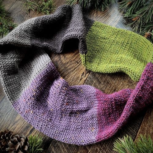 Knitted block stripe infinity scarf in green pink and taupe grey alpaca yarn