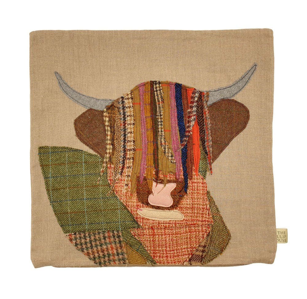 Applique Highland Cow cushion on natural linen cover
