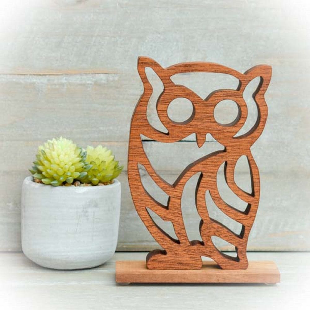 A decorative owl ornament cut from Oak using a scroll saw.