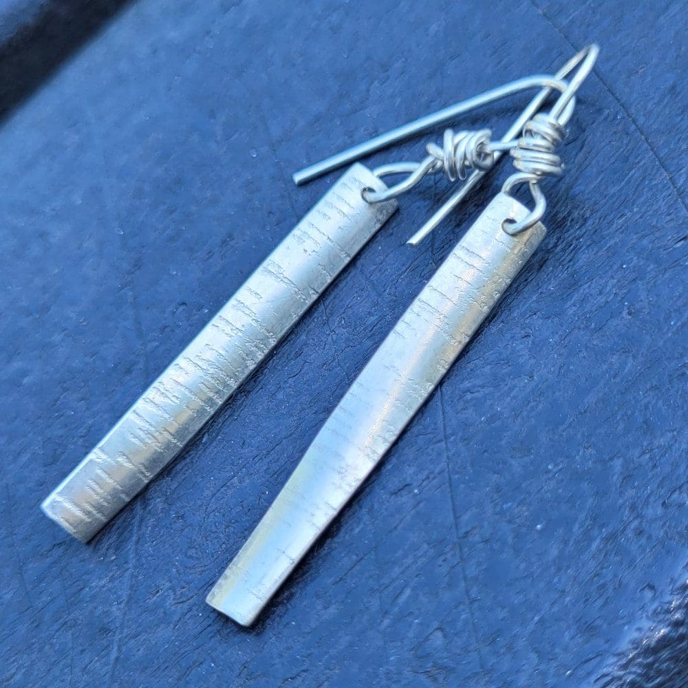 silver earrings with bark texture