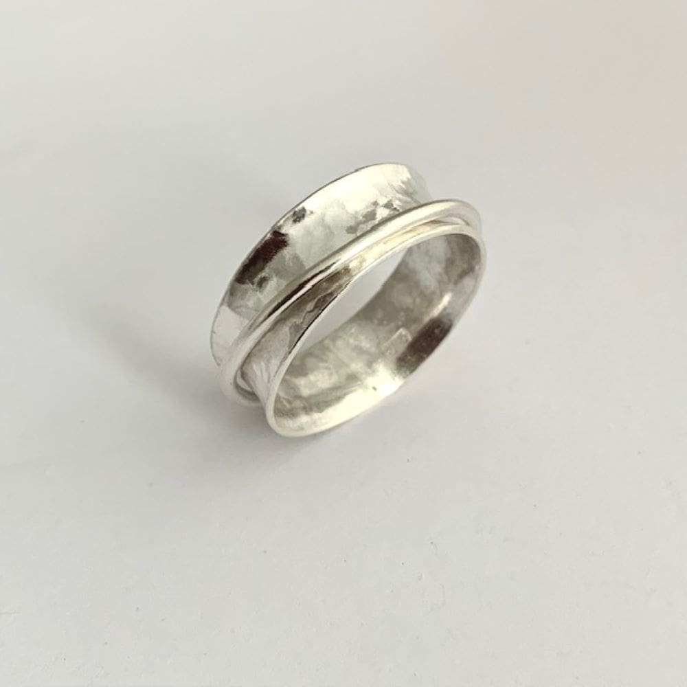 Silver hammered spinner ring
