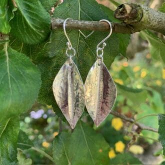 Sterling silver dimpled leaf dangly earrings