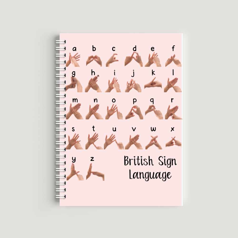 Note book with the British Sign Language alphabet printed BSL