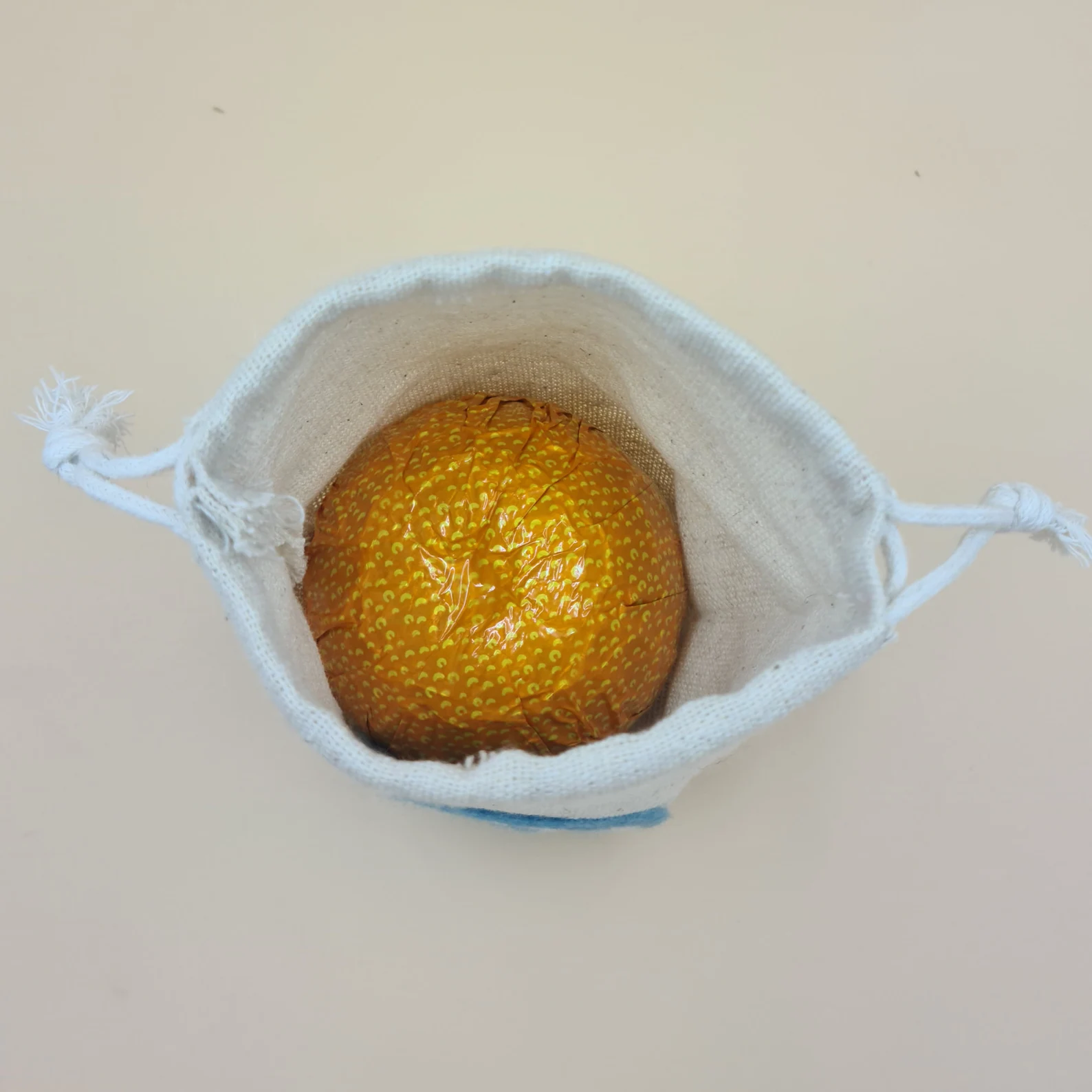 Internal view of cotton drawstring bag including chocolate orange