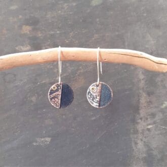 Recycled copper earrings with texture created using brass watch parts
