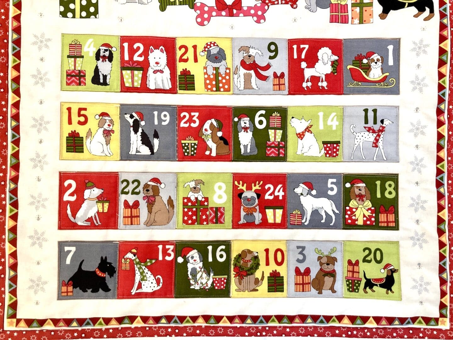 Quilted advent calendar with dogs | The British Craft House