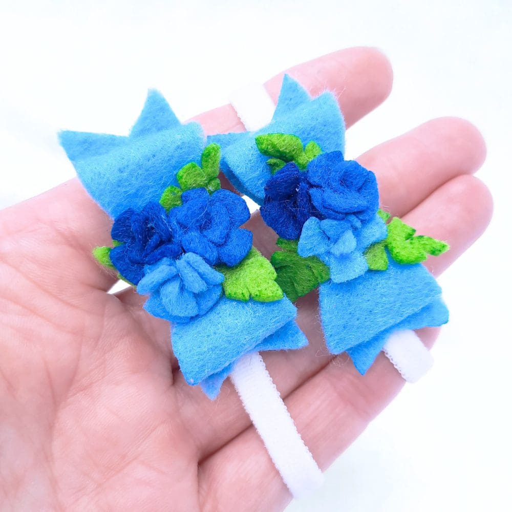 Hair elastics with felt bow and roses in blue