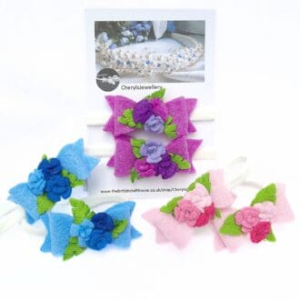 Hair elastics with felt bow and roses in blue, purple and pink