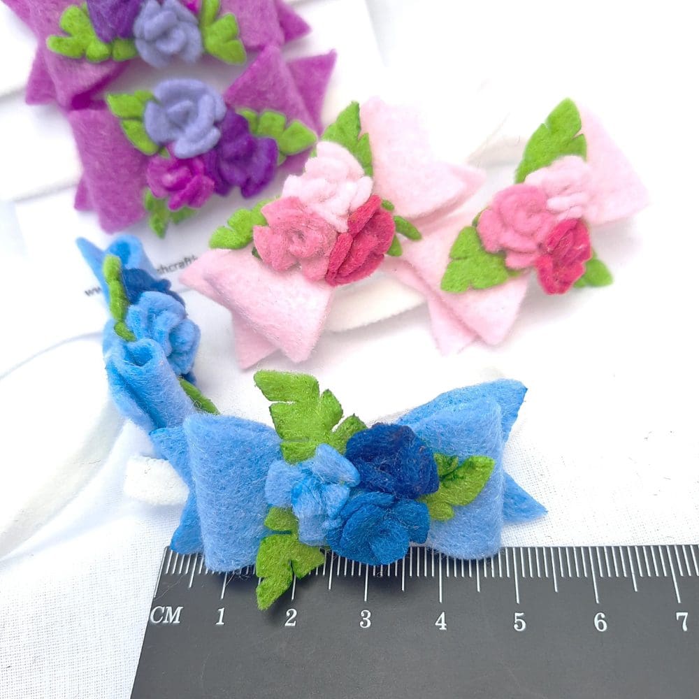 Hair elastics with felt bow and roses in blue, purple and pink