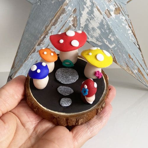 Handmade polymer clay toadstool and gnome quirky ornament on log slice