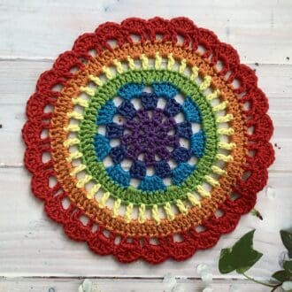 Crochet rainbow mandala style table mat