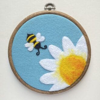 Needle felted bee and daisy hoop picture